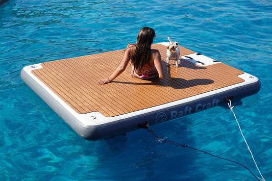 RC102 floating dock in use, a person reclining on the deck