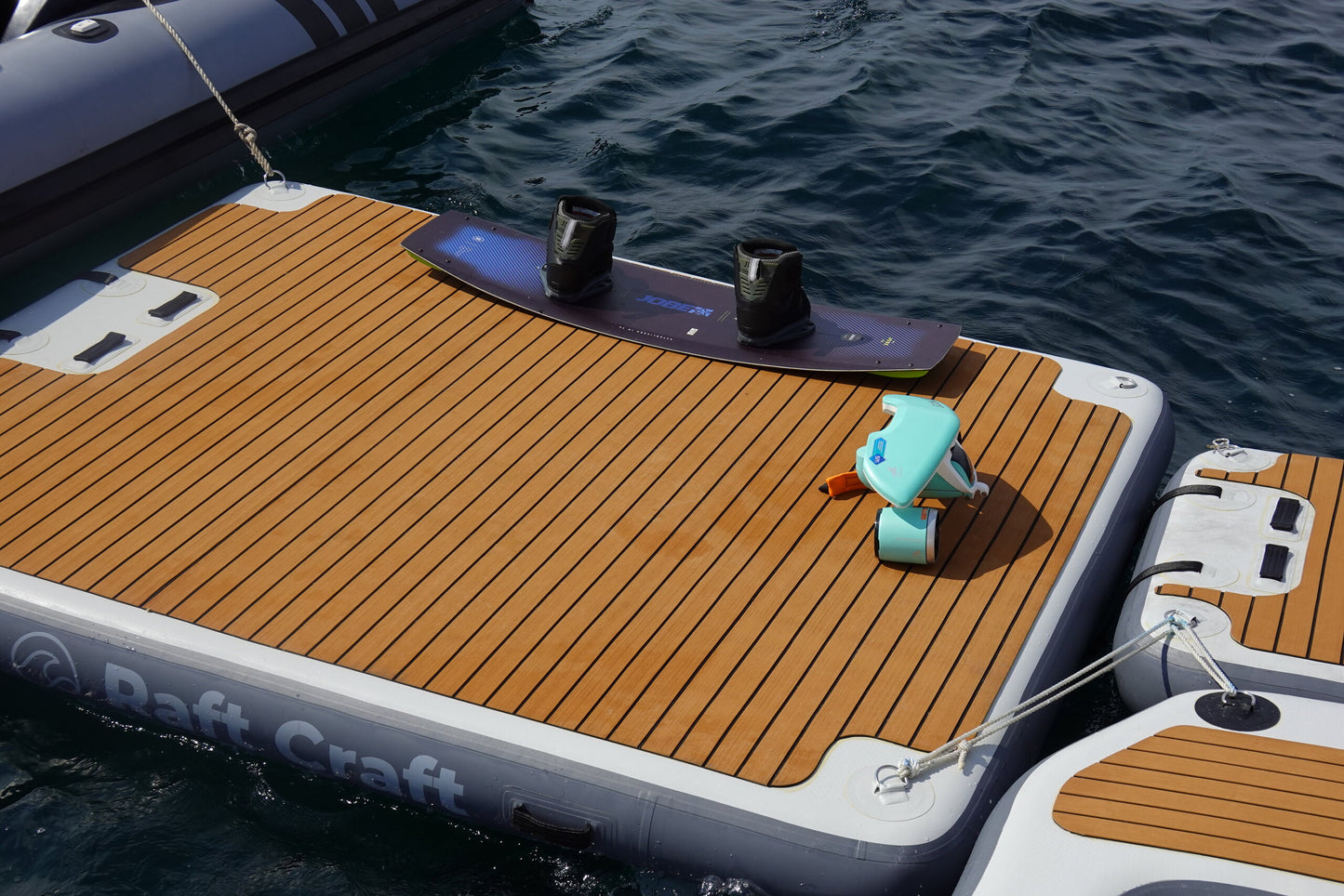 RC102 floating dock with a dog on the deck