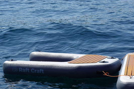 Raft Craft RCD102 large dog ramp on open water, horseshoe shape and Raft Craft wordmark visible